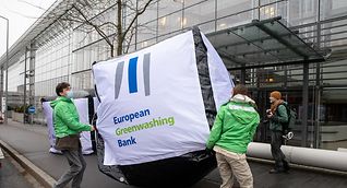 Greenpeace hold a protest against the European Investment Bank in Luxembourg over alleged greenwashing in November 2021