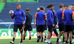 Leipzig's German headcoach Julian Nagelsmann looks at players during a training session at the Jose Alvalade stadium in Lisbon on August 12, 2020 on the eve of the UEFA Champions League quarter-final football match between Leipzig and Atletico Madrid. (Photo by Miguel A. Lopes / AFP)
