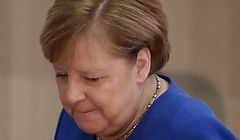 German Chancellor Angela Merkel leaves after delivering a speech on January 24, 2020 during the  Turkish-German University�s new facilities opening ceremony in Istanbul. (Photo by TOLGA BOZOGLU / POOL / AFP)