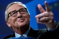 European Commission President Jean-Claude Juncker gestures during his last presser in Brussels on November 29, 2019. - The 64-year-old head of the EU's executive is at the end of his five-year mandate and is expected to hand over the reins to his successor on December 1, 2019. (Photo by Kenzo TRIBOUILLARD / AFP)