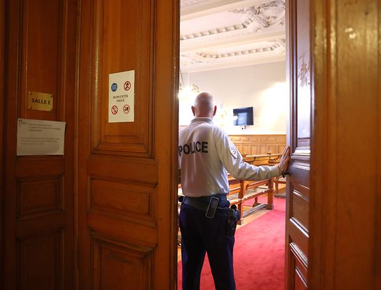An officer at the Court of Appeal in Nancy, France, looks at the hearing room on Wednesday morning