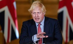 A handout image released by 10 Downing Street, shows Britain's Prime Minister Boris Johnson standing in front of the government's newest slogan "Stay Alert, Control the Virus, Save Lives" as he speaks during a remote press conference to update the nation on the COVID-19 pandemic, inside 10 Downing Street in central London on May 25, 2020. - British Prime Minister Boris Johnson's top aide Dominic Cummings defied calls to resign on Monday over allegations that he broke coronavirus rules and undermined the government's response to the health crisis. Cummings told reporters that he acted "reasonably and legally" when he drove across the country with his wife while she was suffering from the virus, despite official advice to stay at home. (Photo by Andrew PARSONS / 10 Downing Street / AFP) / RESTRICTED TO EDITORIAL USE - MANDATORY CREDIT "AFP PHOTO / 10 DOWNING STREET / Andrew Parsons " - NO MARKETING - NO ADVERTISING CAMPAIGNS - DISTRIBUTED AS A SERVICE TO CLIENTS