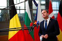 Luxembourg's Prime Minister Xavier Bettel speaks to media on the second day of a European Union (EU) summit at The European Council Building in Brussels on October 22, 2021. (Photo by JOHANNA GERON / POOL / AFP)