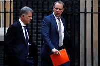 Britain's Foreign Secretary and First Secretary of State Dominic Raab (R) walks from the Foreign Office towards 10 Downing Street in central London on January 6, 2020. - The leaders of Germany, France and Britain on Sunday urged Iran to drop measures that go against the 2015 nuclear deal, after Tehran announced it would no longer abide by a limit on enrichment. With tensions rising following the US drone strike at Baghdad airport that killed Iranian general Qasem Soleimani and top Iraqi military figure Abu Mahdi al-Muhandis, the European leaders also urged Iran to refrain from taking "further violent actions or support for them." (Photo by Tolga AKMEN / AFP)