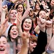TOPSHOT - Yes campaigners react as they wait for the official result of the Irish abortion referendum, at Dublin Castle in Dublin on May 26, 2018. 
Irish Prime Minister Leo Varadkar  hailed a "quiet revolution" on Saturday as this traditionally Catholic country looked set to liberalise some of Europe's strictest abortion laws in a historic landslide referendum vote. / AFP PHOTO / Paul FAITH