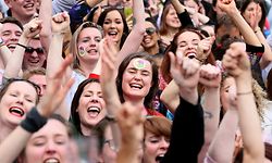 TOPSHOT - Yes campaigners react as they wait for the official result of the Irish abortion referendum, at Dublin Castle in Dublin on May 26, 2018. 
Irish Prime Minister Leo Varadkar  hailed a "quiet revolution" on Saturday as this traditionally Catholic country looked set to liberalise some of Europe's strictest abortion laws in a historic landslide referendum vote. / AFP PHOTO / Paul FAITH