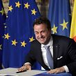 Luxembourg's Prime Minister Xavier Bettel reacts as he signs the new Rome declaration with leaders of 27 European Union countries special during a summit of EU leaders to mark the 60th anniversary of the bloc's founding Treaty of Rome, on March 25, 2017 at Rome's Piazza del Campidoglio (Capitoline Hill).  
Against a backdrop of crises and in the absence of the departing Britain, the leaders signed a new Rome declaration, six decades after the six founding members signed the Treaty of Rome and gave birth to the European Economic Community.
 / AFP PHOTO / Tiziana FABI