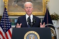 TOPSHOT - US President Joe Biden delivers a national update on the situation at the Russia-Ukraine border at the White House in Washington, DC, February 18, 2022. (Photo by Jim WATSON / AFP)