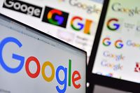 (FILES) In this file photo taken on November 20, 2017 shows logos of US multinational technology company Google displayed on computers' screens.
France will take legal action against Google and Apple for "abusive business practices", Finance Minister Bruno Le Maire said March 14, 2018. / AFP PHOTO / LOIC VENANCE