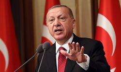 (FILES) In this file photo taken on July 15, 2018 Turkish President Tayyip Erdogan delivers a speech during a ceremony marking the second anniversary of the attempted coup at the Presidential Palace in Ankara, Turkey. - Turkish President Recep Tayyip Erdogan on August 10, 2018 pledged that Turkey would prevail in an "economic war" after the lira crashed to historic lows over Ankara's strains with Washington. (Photo by ADEM ALTAN / AFP)