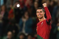 TOPSHOT - Portugal's forward Cristiano Ronaldo celebrates scoring his team's third goal during the UEFA Euro 2024 qualification match between Portugal and Liechtenstein at the Jose Alvalade stadium in Lisbon on March 23, 2023. (Photo by CARLOS COSTA / AFP)
