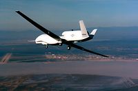 Global Hawk, the U.S. Department of Defense's newest reconnaissance aircraft, flies over Edwards Air Force Base, Calif., on Feb. 28, 1998, during its first flight. The United States is rushing the high-flying endurance reconnaissance drone into the hunt for Osama bin Laden and his al Qaeda network even before operational testing has been completed, Defense Secretary Donald Rumsfeld said November 21, 2001.  REUTERS/DoD
