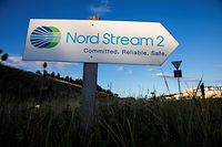 (FILES) This file photo taken on September 07, 2020 shows a road sign directing traffic towards the Nord Stream 2 gas line landfall facility entrance in Lubmin, north eastern Germany. - The controversial new gas pipeline Nord Stream II from Russia will not be allowed to operate in the event of any new "escalation" in Ukraine, under an agreement in principle concluded between Berlin and Washington, Germany's new Foreign Minister Baerbock said on December 12, 2021. (Photo by Odd ANDERSEN / AFP)
