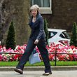 Britain's Home Secretary and new leader of the Conservative Party Theresa May arrives in Downing Street in London on July 12, 2016, as she prepares to attend Prime Minister David Cameron's last Cabinet meeting.  David Cameron chairs his final cabinet meeting on Tuesday after six years as Britain's prime minister, with incoming premier Theresa May preparing to form a new government to deliver Brexit. / AFP PHOTO / CHRIS J RATCLIFFE