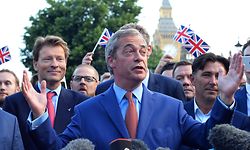 Leader of the United Kingdom Independence Party (UKIP), Nigel Farage (C) speaks during a press conference near the Houses of Parliament in central London on June 24, 2016.
Britain has voted to leave the European Union by 51.9 percent to 48.1 percent, final results from all 382 of Britain's local counting centres showed on Friday. / AFP PHOTO / GLYN KIRK