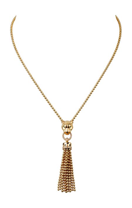 Art-déco-Revival: Ein mit Tsavoriten bestückter Pantherkopf hält in seinem Maul eine Paspel aus Goldperlen und Onyxmosaik.