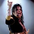 U.S. pop star Michael Jackson performs at the Tokyo Dome in the opening show of his Japanese tour in this December 12, 1992 file photo. Jackson's personal doctor was found guilty on November 7, 2011, of involuntary manslaughter in the singer's death following a six-week trial that captivated Jackson fans around the world. REUTERS/Kimimasa Mayama/Files (JAPAN - Tags: PROFILE ANNIVERSARY OBITUARY ENTERTAINMENT SOCIETY)