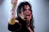 U.S. pop star Michael Jackson performs at the Tokyo Dome in the opening show of his Japanese tour in this December 12, 1992 file photo. Jackson's personal doctor was found guilty on November 7, 2011, of involuntary manslaughter in the singer's death following a six-week trial that captivated Jackson fans around the world. REUTERS/Kimimasa Mayama/Files (JAPAN - Tags: PROFILE ANNIVERSARY OBITUARY ENTERTAINMENT SOCIETY)