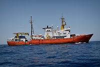 (FILES) In this file photo taken on May 6, 2018 the French NGO's ship Aquarius, a search and rescue ship run in partnership between "SOS Mediterranee" and Doctors without borders (MSF), is seen some 24 nautical miles off the Libyan coast.
Hundreds of people on board a migrant rescue boat were stranded on June 11, 2018 in the Mediterranean between Italy and Malta in a standoff between the two nations, with both refusing to allow the vessel to dock. Some 629 people, including pregnant women and scores of children, have been saved by SOS Mediterranee on June 10 and embarked aboard the French NGO's ship Aquarius, between Malta and Sicily waiting for a secure port. / AFP PHOTO / LOUISA GOULIAMAKI