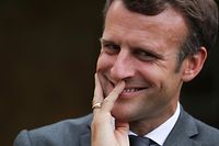 French President Emmanuel Macron reacts as he visits late French fabulist Jean De La Fontaine's birthplace in Chateau-Thierry, northern France, on June 17, 2021. (Photo by PASCAL ROSSIGNOL / POOL / AFP)