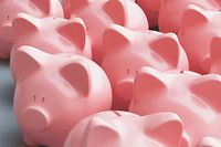 Close-Up Of Piggy Banks Over Gray Background Sparschwein Epargne