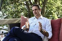 Greece's opposition New Democracy leader Kyriakos Mitsotakis gives an interview to AFP journalists at a hotel near the central Greek city of Volos on July 2, 2019, during his pre-election campaign five days ahead of the general elections. - Greeks vote on July 7, 2019 in a general election that is the first in the country's post-bailout era, which looks set to oust leftist Prime Minister Alexis Tsipras after a record-setting four years in power. (Photo by ARIS MESSINIS / AFP)