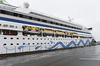 The German cruise ship Aida Aura is pictured on March 3, 2020 at the quay in Haugesund, Norway, pending the answer, whether two quarantineed passengers have been infected with the coronavirus. (Photo by Marit Hommedal / NTB Scanpix / AFP) / Norway OUT
