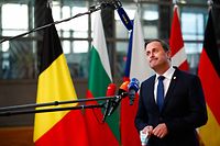 Luxembourg's Prime Minister Xavier Bettel speaks to media on the second day of a European Union (EU) summit at The European Council Building in Brussels on October 22, 2021. (Photo by JOHANNA GERON / POOL / AFP)