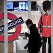 A man walks past the closed entrance of the Eurostar terminal at Brussels South railway station (Gare du Midi), in Brussels, on December 21, 2020 after Britain's European neighbors began closing their borders to travelers from the United Kingdom amid alarm about a new strain of coronavirus. - Countries around the world closed their borders to Britain on December 21, 2020 in a race to contain a fast-spreading variant of the coronavirus as the European Union neared approval of its first jab for the bloc's vaccination campaign. (Photo by JOHN THYS / AFP)