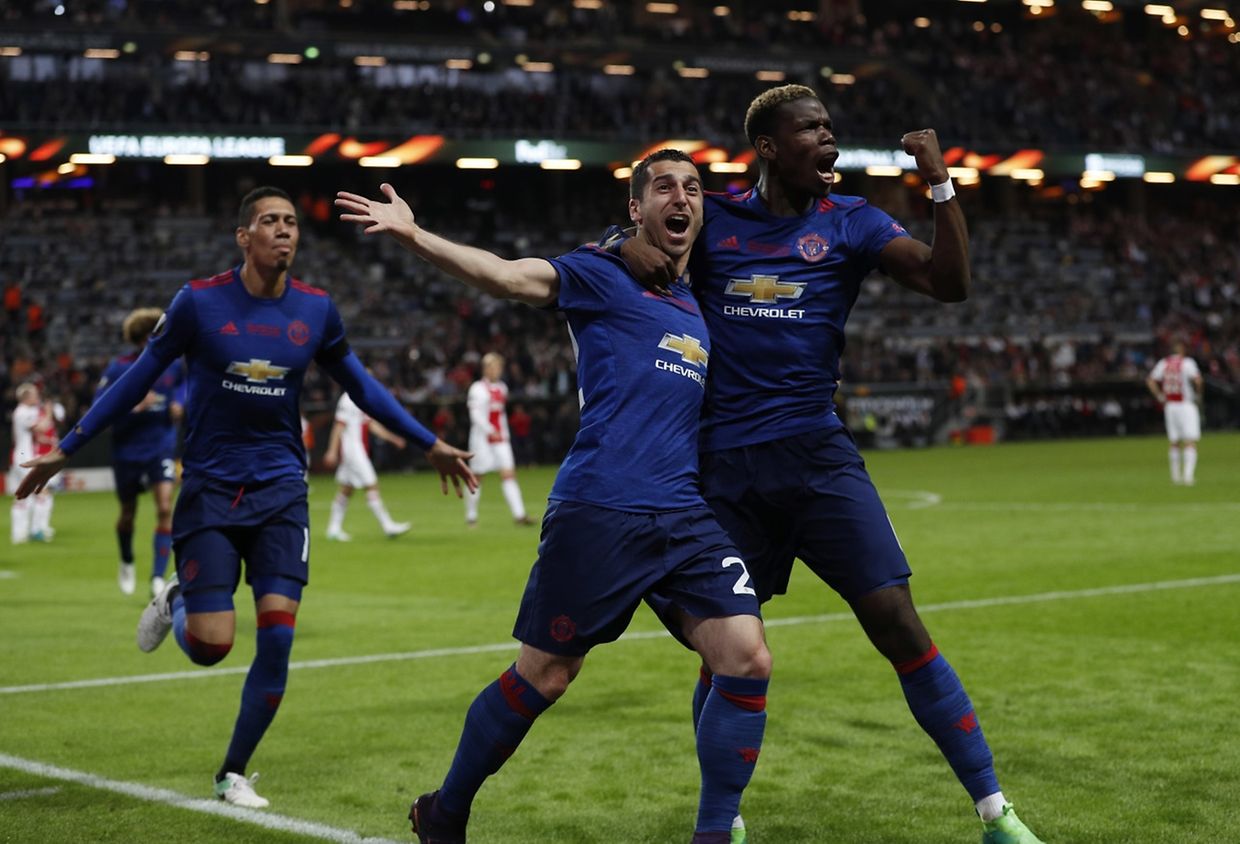 Football Soccer - Ajax Amsterdam v Manchester United - UEFA Europa League Final - Friends Arena, Solna, Stockholm, Sweden - 24/5/17 Manchester United's Henrikh Mkhitaryan celebrates scoring their second goal with Paul Pogba and Chris Smalling Reuters / Lee Smith Livepic