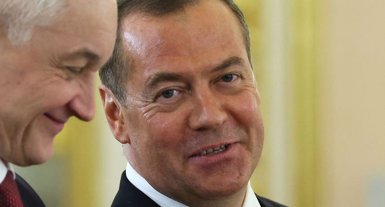 Russia's former leader Dmitry Medvedev, a President Putin ally who is now deputy chairman of the country's security council, is seen before a meeting of the leaders of Russia and China and members of the both delegations at the Kremlin in Moscow on March 21, 2023. (Photo by Sergei KARPUKHIN / SPUTNIK / AFP)