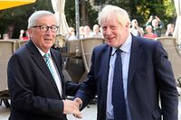 EU Commission president Jean-Claude Juncker (L) shakes hands with British Prime Minister Boris Johnson (R) prior to their meeting, on September 16, 2019 in Luxembourg - Six weeks before he is due to lead Britain out of the European Union, Prime Minister Boris Johnson meets Jean-Claude Juncker, insisting that a Brexit deal is possible. Downing Street has confidently billed the Luxembourg visit as part of efforts to negotiate an orderly divorce from the union before an October 17 EU summit. (Photo by Fran�ois WALSCHAERTS / AFP)
