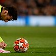 Barcelona's Argentinian forward Lionel Messi ties his shoelaces during the UEFA Champions league first leg quarter-final football match between Manchester United and Barcelona at Old Trafford in Manchester, north west England, on April 10, 2019. (Photo by LLUIS GENE / AFP)