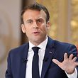 French President Emmanuel Macron gestures during his live address following the "Great National Debate", at the Elysee Palace in Paris on April 25, 2019. - Macron on April 25, 2019 vowed to press ahead with his government's programme to transform France, adding public order must be restored after months of protests. (Photo by ludovic MARIN / AFP)