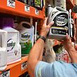 (FILES) This file photo taken on July 9, 2018 shows customer Gary Harms shopping for Roundup products at a store in San Rafael, California. - Shares in German chemicals and pharmaceuticals giant Bayer climbed Friday, January 24, 2020 on a report it was nearing a $10 billion settlement with US plaintiffs claiming weedkiller Roundup caused their cancer. (Photo by JOSH EDELSON / AFP)