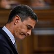 (FILES) Spain's Prime Minister Pedro Sanchez reacts as he delivers a speech during the parliamentary debate on the State of the Nation, at the Congress of Deputies in Madrid on July 12, 2022. Spanish PM on May 29, 2023 has called snap elections in July after Spain's right-wing opposition posted strong gains both locally and regionally in a clear setback for Socialist Prime Minister. At a local level, the main opposition Popular Party secured the largest number of votes with 90 percent of the ballots counted, while the Socialists lost several regions they held, notably Valencia, media reports said. (Photo by Pierre-Philippe MARCOU / AFP)