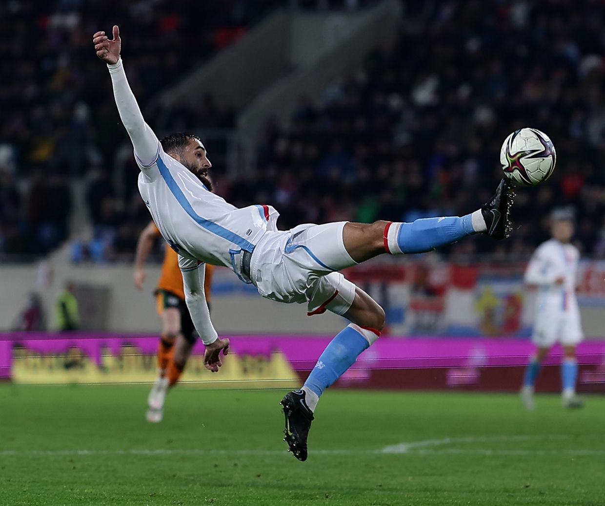 What feels like an overhead kick is actually Wahid Selimovich who went over the ball.
