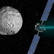 NASA's Dawn spacecraft is pictured in this August 30, 2012 handout artist's rendition of its arrival at the giant asteroid Vesta on July 15, 2011. The spacecraft is scheduled to leave Vesta on September 4 PDT (September 5 EDT) to start its two-and-a-half-year journey to the dwarf planet Ceres. Dawn began its 3-billion-mile (5-billion kilometer) odyssey to explore the two most massive objects in the main asteroid belt in 2007.  REUTERS/NASA/JPL-Caltech/Handout    (UNITED STATES - Tags: SCIENCE TECHNOLOGY) THIS IMAGE HAS BEEN SUPPLIED BY A THIRD PARTY. IT IS DISTRIBUTED, EXACTLY AS RECEIVED BY REUTERS, AS A SERVICE TO CLIENTS. FOR EDITORIAL USE ONLY. NOT FOR SALE FOR MARKETING OR ADVERTISING CAMPAIGNS