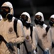 (FILES) In this file photo taken on August 18, 2020 Soldiers from the 4th Military Region of the Brazilian Armed Forces take part in the cleaning and disinfection of the Municipal Market in the Belo Horizonte, state of Minas Gerais, Brazil, amid the COVID-19 coronavirus pandemic. - Brazil topped four million Covid-19 cases on September 3 as health ministry officials said infections were beginning to slow in the world's second worst-hit country. (Photo by DOUGLAS MAGNO / AFP)