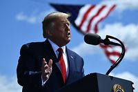 TOPSHOT - US President Donald Trump delivers remarks on the economy at Mankato Regional Airport on August 17, 2020 in Mankato, Minnesota. (Photo by Brendan Smialowski / AFP)