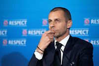 In this handout photograph released by UEFA, UEFA President Aleksander Ceferin addresses media representatives during a press conference following the UEFA Executive Committee meeting in Montreux on April 19, 2021. - Plans for a breakaway Super League announced by twelve of European football's most powerful clubs plunged European football into an unprecedented crisis, with threats of legal action and possible bans for players, as UEFA president Aleksander Ceferin called it a "spit in the face" for supporters. Six Premier League teams -- Liverpool, Manchester United, Arsenal, Chelsea, Manchester City and Tottenham Hotspur -- joined forces with Spanish giants Real Madrid, Barcelona and Atletico Madrid and Italian trio Juventus, Inter Milan and AC Milan to launch the planned competition. (Photo by Richard Juilliart / UEFA / AFP) / RESTRICTED TO EDITORIAL USE - MANDATORY CREDIT "AFP PHOTO /UEFA/RICHARD JUILLIART " - NO MARKETING - NO ADVERTISING CAMPAIGNS - DISTRIBUTED AS A SERVICE TO CLIENTS