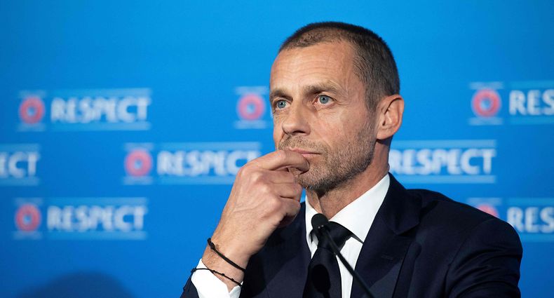 In this handout photograph released by UEFA, UEFA President Aleksander Ceferin addresses media representatives during a press conference following the UEFA Executive Committee meeting in Montreux on April 19, 2021. - Plans for a breakaway Super League announced by twelve of European football's most powerful clubs plunged European football into an unprecedented crisis, with threats of legal action and possible bans for players, as UEFA president Aleksander Ceferin called it a "spit in the face" for supporters. Six Premier League teams -- Liverpool, Manchester United, Arsenal, Chelsea, Manchester City and Tottenham Hotspur -- joined forces with Spanish giants Real Madrid, Barcelona and Atletico Madrid and Italian trio Juventus, Inter Milan and AC Milan to launch the planned competition. (Photo by Richard Juilliart / UEFA / AFP) / RESTRICTED TO EDITORIAL USE - MANDATORY CREDIT "AFP PHOTO /UEFA/RICHARD JUILLIART " - NO MARKETING - NO ADVERTISING CAMPAIGNS - DISTRIBUTED AS A SERVICE TO CLIENTS