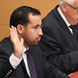 (FILES) In this file photo taken on September 19, 2018 Former Elysee senior security officer Alexandre Benalla raises his hand as he takes the oath before a Senate committee in Paris. - Benalla has been placed under police custody, suspected of "forgery and falsification" in the case of his diplomatic passports, AFP reported on January 17, 2019. (Photo by Alain JOCARD / AFP)