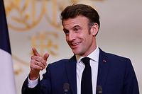 French President Emmanuel Macron delivers a speech during a collective award ceremony for sport celebrities, at the Elysee Presidential Palace in Paris on January 17, 2023. (Photo by Ludovic MARIN / POOL / AFP)