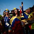 Colombia's football fans pose as they arrive before the Russia 2018 World Cup Group H football match between Poland and Colombia at the Kazan Arena in Kazan on June 24, 2018. / AFP PHOTO / Benjamin CREMEL / RESTRICTED TO EDITORIAL USE - NO MOBILE PUSH ALERTS/DOWNLOADS