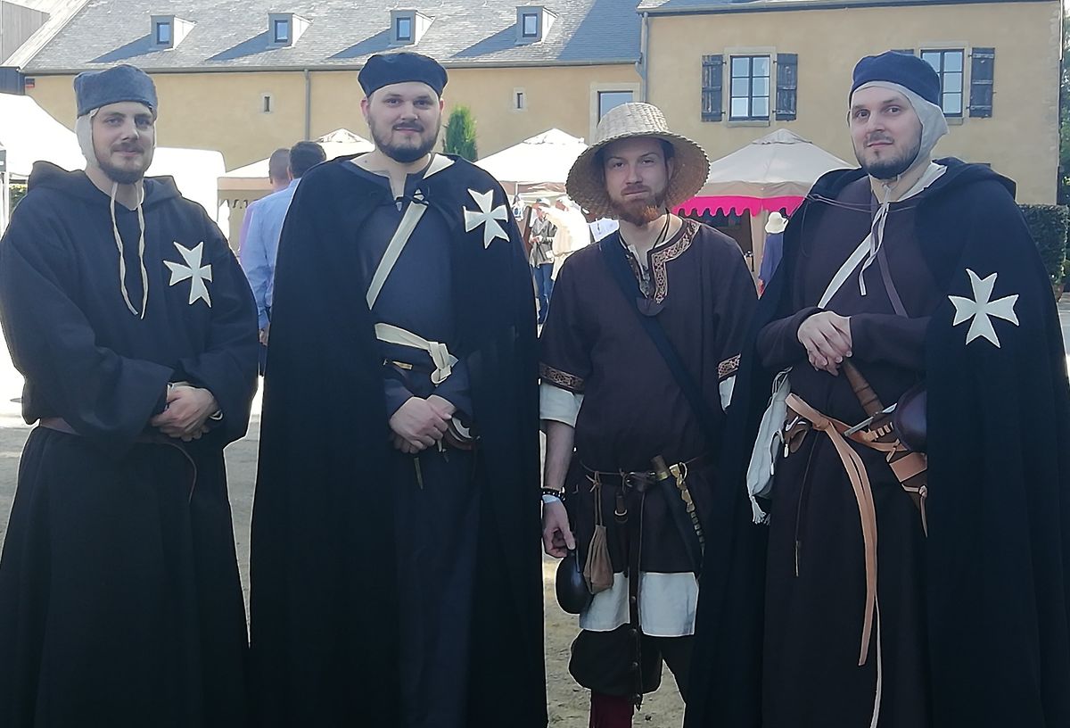 Visitors dressed in Medieval costume