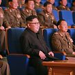 This undated picture released from North Korea's official Korean Central News Agency (KCNA) on July 16, 2016 shows North Korean leader Kim Jong-Un (C) watching an art performance staged by the amateur art groups of the Korean People's Army (KPA) units in Pyongyang. / AFP PHOTO / KCNA VIA KNS / KCNA / South Korea OUT / REPUBLIC OF KOREA OUT   ---EDITORS NOTE--- RESTRICTED TO EDITORIAL USE - MANDATORY CREDIT "AFP PHOTO/KCNA VIA KNS" - NO MARKETING NO ADVERTISING CAMPAIGNS - DISTRIBUTED AS A SERVICE TO CLIENTS
THIS PICTURE WAS MADE AVAILABLE BY A THIRD PARTY. AFP CAN NOT INDEPENDENTLY VERIFY THE AUTHENTICITY, LOCATION, DATE AND CONTENT OF THIS IMAGE. THIS PHOTO IS DISTRIBUTED EXACTLY AS RECEIVED BY AFP.  / 