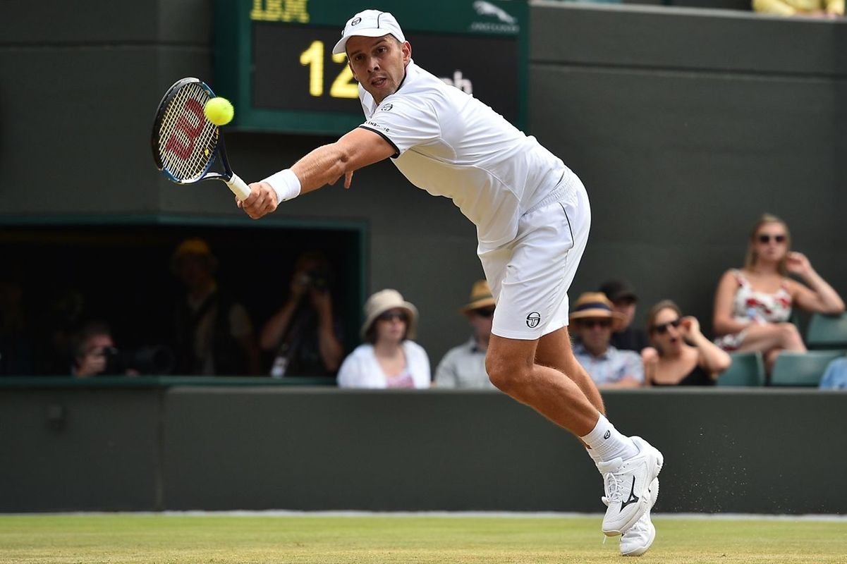 Luxembourg's Gilles Muller returns against Spain's Rafael Nadal