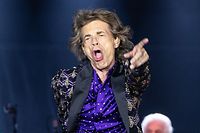 TOPSHOT - The Rolling Stones band members (L-R) Ronnie Wood, Mick Jagger, Charlie Watts and Keith Richards perform on stage during their "No Filter" tour at NRG Stadium on July 27, 2019 in Houston, Texas. (Photo by SUZANNE CORDEIRO / AFP)
