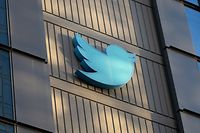 The Twitter logo is seen on the exterior of Twitter headquarters in San Francisco, California, on October 28, 2022. - Elon Musk began his first full day leading Twitter, with critics and fans anxious to see how the world's richest man will run one of the most prominent social media platforms. (Photo by Constanza HEVIA / AFP)